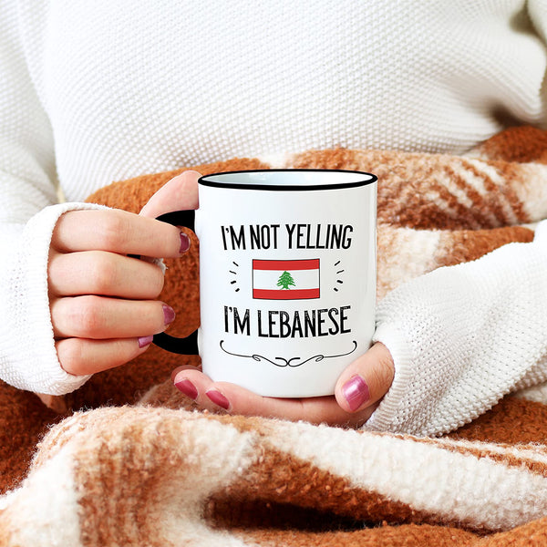 Casitika Funny Lebanon Gifts. Not Yelling I'm Lebanese Ceramic Coffee Mug. Cup Idea for Proud Men/Women Featuring The Country Flag. (11 oz Black Handle/Rim)